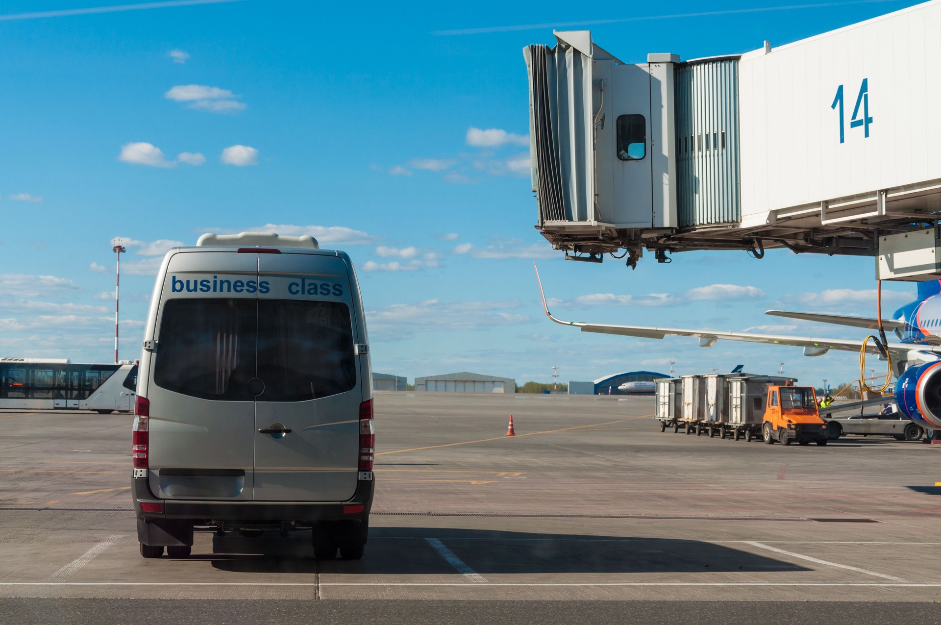 Business class service at the airport. Business class transfer. Airport shuttle bus for business class passengers.